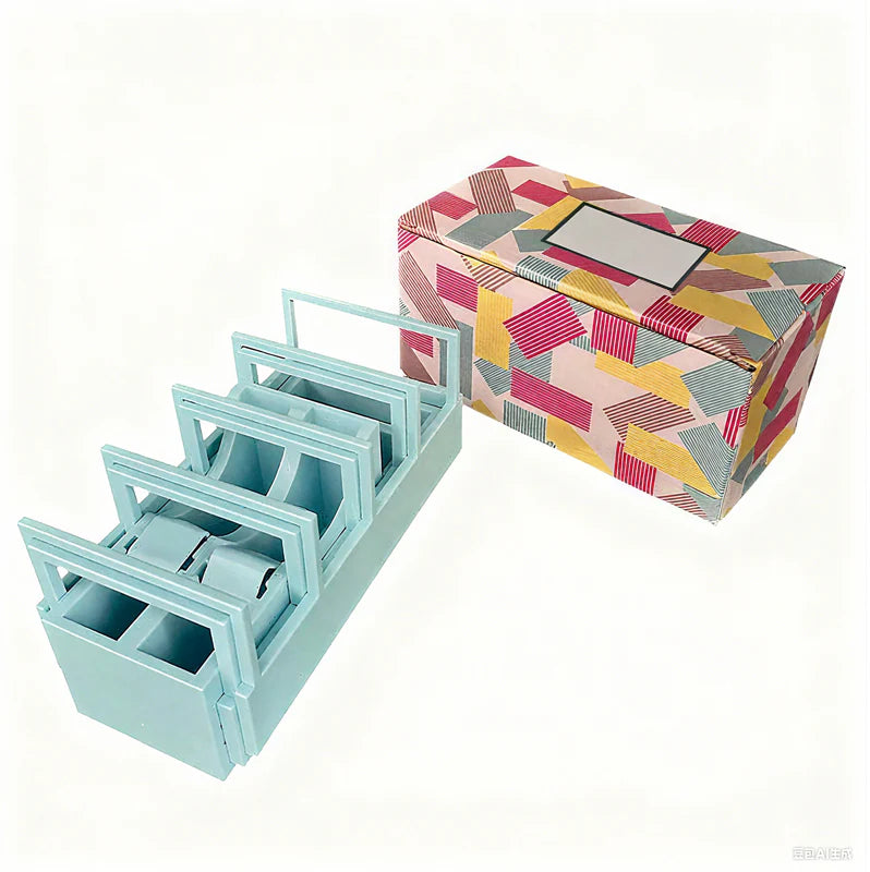 🔥Večfunkcijski podajalnik lepilnega traku - 18-segmentni sistem za hitro rezanje in organizator, ki prihrani prostor