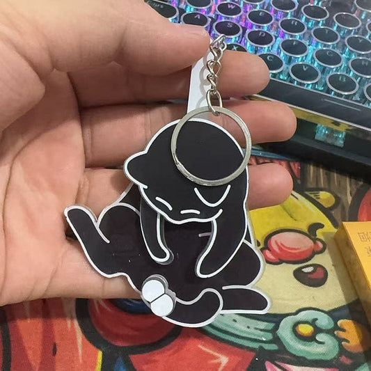 Igranje z jajci in obeskom za ključe z muckom